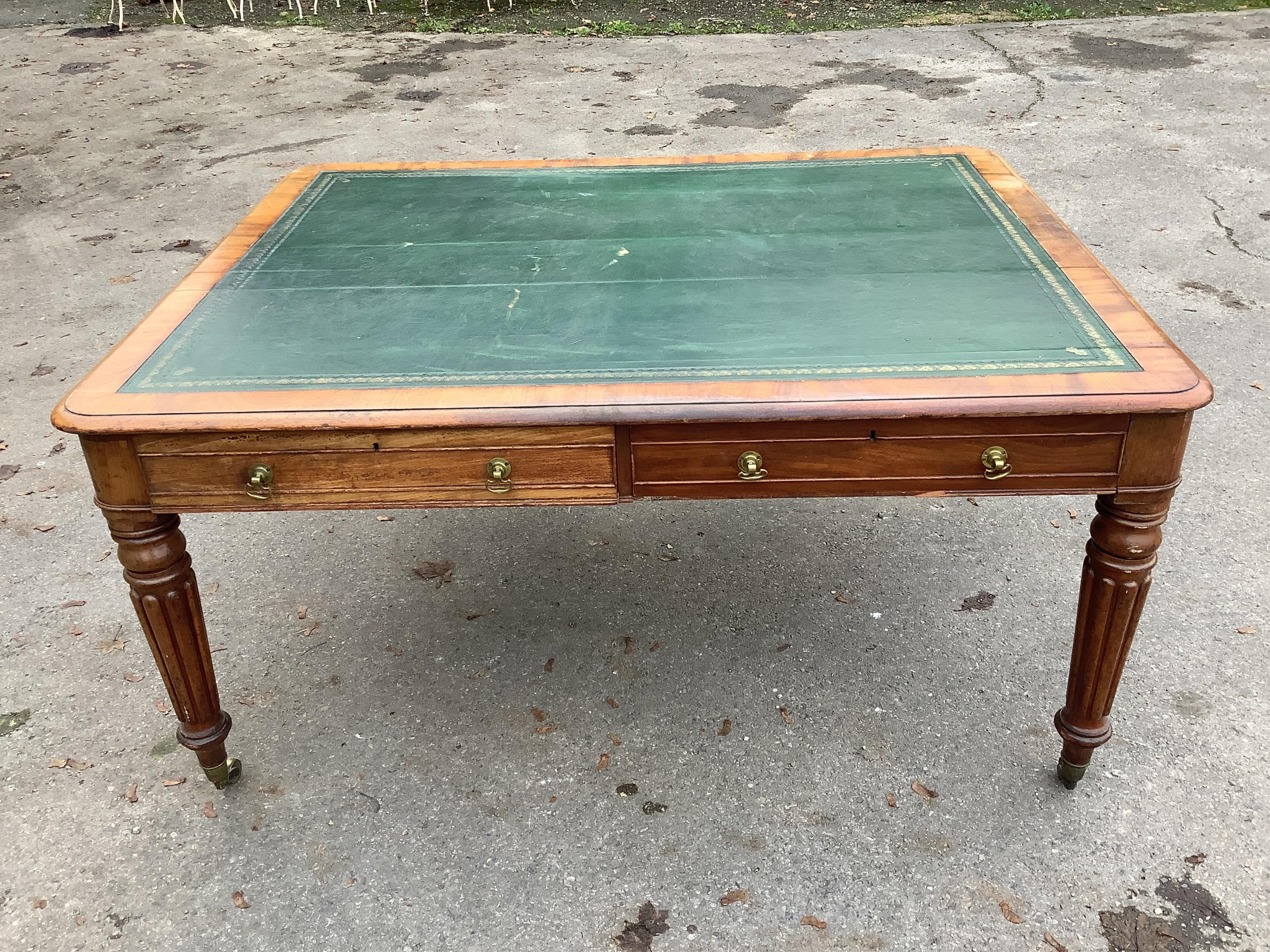 An early Victorian mahogany library table fitted four drawers, width 160cm, depth 130cm, height 78cm. Condition - fair